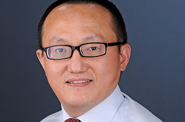 Court exonerates Kansas professor in China research fraud case